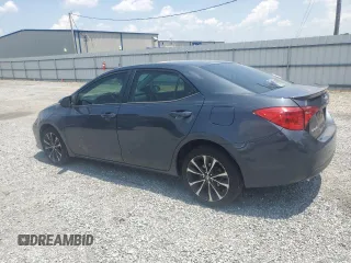 2019 Toyota Corolla L z VIN 5YFBURHE4KP869548, wystawiony jako Copart lot #59943055 z przebiegiem 155 099 mil mil oraz Czysty tytuł • Clean title. Historia ofert i sprzedaży dostępna na DreamBid. Obrazek 2.