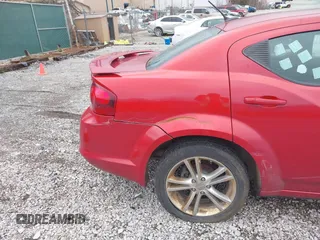 2014 Dodge Avenger SE with VIN 1C3CDZAB0EN220002, listed as a IAAI auction lot 41719914 with 165,330 mi miles and . Bid and sale history available at DreamBid. Image 14.