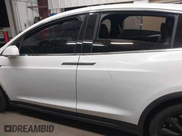 2020 Tesla Model X Long Range with VIN 5YJXCDE22LF305223, listed as a IAAI auction lot 41989862 with 48,309 mi miles. Bid and sale history available at carsss.com. Image 14.