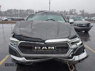 2021 Ram 1500 Limited with VIN 1C6SRFHT4MN588369, listed as a IAAI auction lot 41553981 with 51,293 mi miles and . Bid and sale history available at DreamBid. Image 6.