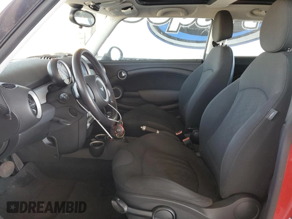 2007 MINI Hardtop with VIN WMWMF33587TT50877, listed as a Copart auction lot 63683795 with 105,078 mi miles and Clean title. Bid and sale history available at DreamBid. Image 7.