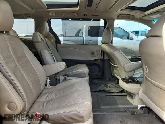 2011 Toyota Sienna XLE AAS with VIN 5TDYK3DC5BS081015, listed as a Copart auction lot 61096595 with 291,855 mi miles and Salvage title. Bid and sale history available at DreamBid. Image 11.