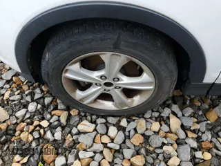 2014 Ford Escape SE z VIN 1FMCU9GX8EUC02895, wystawiony jako IAAI lot #42511705 z przebiegiem 104 900 mil mil oraz . Historia ofert i sprzedaży dostępna na DreamBid. Obrazek 1.