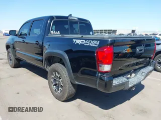 2016 Toyota Tacoma SR with VIN 3TMCZ5AN3GM019210, listed as a IAAI auction lot 42003617 with 171,581 mi miles. Bid and sale history available at carsss.com. Image 3.