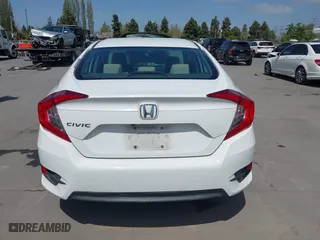 2016 Honda Civic Sedan LX with VIN 19XFC2F54GE215012, listed as a IAAI auction lot 42046334 with 146,348 mi miles. Bid and sale history available at carsss.com. Image 16.
