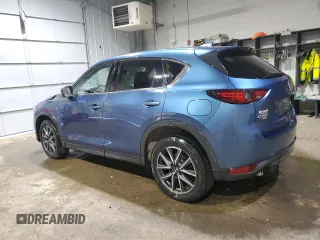 2018 Mazda CX-5 Grand Touring with VIN JM3KFBDM1J0304706, listed as a Copart auction lot 46123415 with 104,004 mi miles and Salvage title. Bid and sale history available at DreamBid. Image 2.