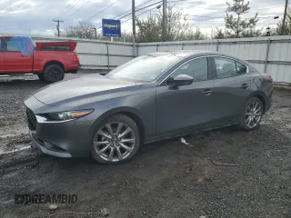 2022 Mazda 3 Premium with VIN 3MZBPADL3NM311549, listed as a Copart auction lot 51748215 with 16,600 mi miles and Salvage Title. Bid and sale history available at DreamBid. Image 1.