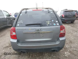 2009 Kia Sportage LX with VIN KNDJF724997570871, listed as a IAAI auction lot 41003267 with 231,654 mi miles and . Bid and sale history available at carsss.com. Image 16.
