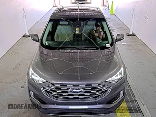 2021 Ford Edge Titanium z VIN 2FMPK3K92MBA53689, wystawiony jako IAAI lot #42501151 z przebiegiem 93 941 mil mil oraz . Historia ofert i sprzedaży dostępna na DreamBid. Obrazek 1.