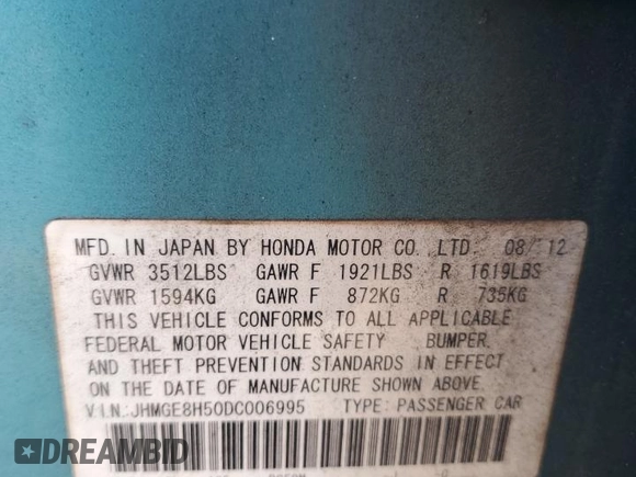 2013 Honda Fit Sport z VIN JHMGE8H50DC006995, wystawiony jako Copart lot #58854875 z przebiegiem 78 207 mil mil oraz Szkoda całkowita • Salvage title. Historia ofert i sprzedaży dostępna na DreamBid. Obrazek 13.