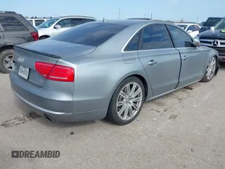 2011 Audi A8 with VIN WAUAVAFD5BN021080, listed as a IAAI auction lot 41223418 with 80,538 mi miles and . Bid and sale history available at DreamBid. Image 4.