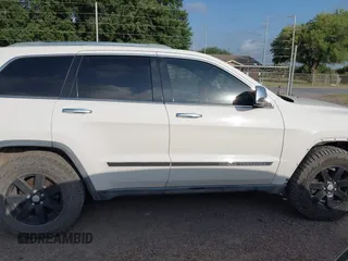 2011 Jeep Grand Cherokee Overland Summit with VIN 1J4RR6GT9BC586712, listed as a IAAI auction lot 42427655 with 157,549 mi miles and . Bid and sale history available at DreamBid. Image 14.