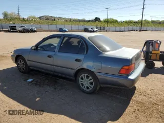 1994 Toyota Corolla with VIN 1NXAE04B7RZ129212, listed as a Copart auction lot 56760095 with 156,822 mi miles and Non repairable. Bid and sale history available at DreamBid. Image 2.