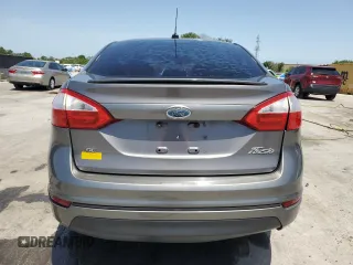 2014 Ford Fiesta SE z VIN 3FADP4BJ4EM110277, wystawiony jako Copart lot #56921115 z przebiegiem 126 536 mil mil oraz Szkoda całkowita • Salvage title. Historia ofert i sprzedaży dostępna na DreamBid. Obrazek 6.