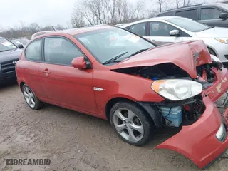 2008 Hyundai Accent SE with VIN KMHCN36C58U070319, listed as a IAAI auction lot 42010544 with 118,487 mi miles. Bid and sale history available at carsss.com. Image 12.