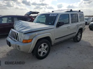 2009 Jeep Commander Sport with VIN 1J8HH48K59C514861, listed as a Copart auction lot 44076015 with 129,674 mi miles and Salvage Title. Bid and sale history available at DreamBid. Image 1.
