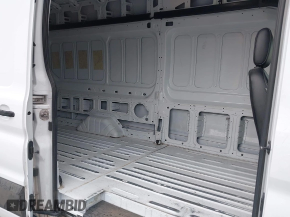 2023 Ford Transit Cargo with VIN 1FTBR3U89PKA09391, listed as a IAAI auction lot 41993662 with 36,147 mi miles and . Bid and sale history available at DreamBid. Image 8.