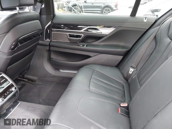 2019 BMW 7 Series 740i with VIN WBA7E2C57KB217973, listed as a IAAI auction lot 39064321 with 54,818 mi miles and . Bid and sale history available at DreamBid. Image 8.