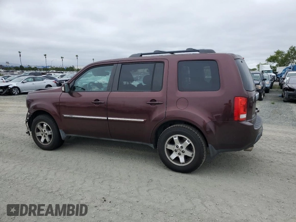2011 Honda Pilot Touring z VIN 5FNYF3H92BB039165, wystawiony jako Copart lot #59596105 z przebiegiem 182 944 mil mil oraz Szkoda całkowita • Salvage title. Historia ofert i sprzedaży dostępna na DreamBid. Obrazek 2.