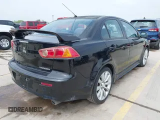 2009 Mitsubishi Lancer with VIN JA3AU86W29U039924, listed as a IAAI auction lot 41923692 with 183,591 mi miles and . Bid and sale history available at DreamBid. Image 4.