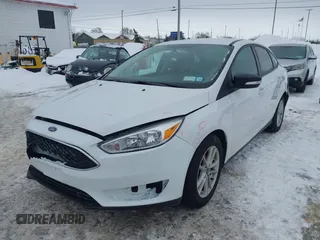 2017 Ford Focus SE with VIN 1FADP3F20HL235067, listed as a IAAI auction lot 41580300 with 79,009 mi miles and . Bid and sale history available at DreamBid. Image 14.