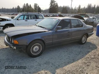 1994 BMW 7 Series z VIN WBAGD4329RDE68127, wystawiony jako Copart lot #70697044 z przebiegiem 179 943 mil mil oraz Czysty tytuł • Clean title. Historia ofert i sprzedaży dostępna na DreamBid. Obrazek 1.