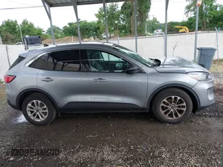 2022 Ford Escape SE with VIN 1FMCU0G6XNUB13770, listed as a IAAI auction lot 42697195 with 26,428 mi miles and . Bid and sale history available at DreamBid. Image 13.