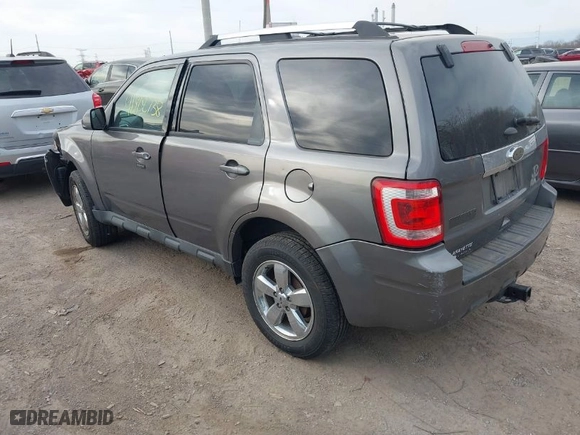 2012 Ford Escape Limited with VIN 1FMCU0E73CKB00640, listed as a IAAI auction lot 41802738 with 128,866 mi miles. Bid and sale history available at carsss.com. Image 3.