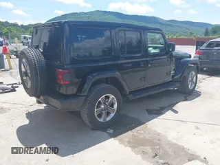 2021 Jeep Wrangler Unlimited Sahara with VIN 1C4HJXEN4MW610287, listed as a IAAI auction lot 42538525 with 24,861 mi miles and . Bid and sale history available at DreamBid. Image 4.