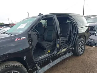 2023 Chevrolet Tahoe Z71 with VIN 1GNSKPKD9PR389603, listed as a IAAI auction lot 42082916 with 33,843 mi miles and . Bid and sale history available at DreamBid. Image 6.