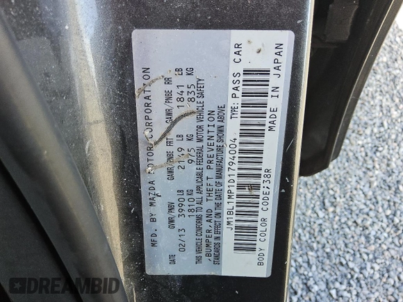 2013 Mazda 3 i Grand Touring with VIN JM1BL1MP1D1794004, listed as a Copart auction lot 52035405 with 140,058 mi miles and Clean Title. Bid and sale history available at DreamBid. Image 12.