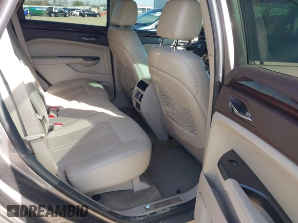 2012 Cadillac SRX Performance Collection with VIN 3GYFNBE3XCS565616, listed as a IAAI auction lot 41835476 with 141,259 mi miles. Bid and sale history available at carsss.com. Image 8.
