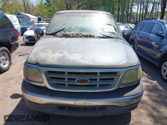 2000 Ford F-150 XL with VIN 1FTZF0722YKB38958, listed as a IAAI auction lot 42050827 with 235,315 mi miles. Bid and sale history available at carsss.com. Image 6.