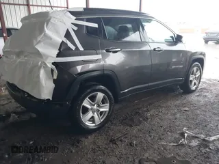 2022 Jeep Compass Latitude with VIN 3C4NJDBB1NT223599, listed as a IAAI auction lot 42181714 with 52,071 mi miles and . Bid and sale history available at DreamBid. Image 4.