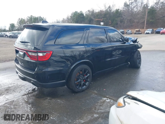 2023 Dodge Durango SRT Hellcat Premium with VIN 1C4SDJH90PC557375, listed as a IAAI auction lot 41328850 with 30,697 mi miles and . Bid and sale history available at DreamBid. Image 4.
