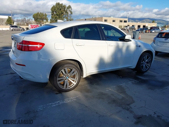 2012 BMW X6 M with VIN 5YMGZ0C59CLK14913, listed as a IAAI auction lot 41635362 with 137,979 mi miles. Bid and sale history available at carsss.com. Image 4.