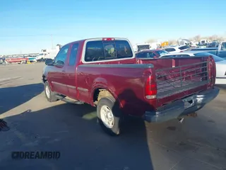 1997 Ford F-150 XL with VIN 1FTDX1869VKA51231, listed as a IAAI auction lot 41846817 with 297,327 mi miles. Bid and sale history available at carsss.com. Image 3.