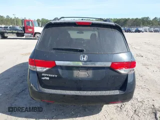 2015 Honda Odyssey EX-L with VIN 5FNRL5H65FB088106, listed as a IAAI auction lot 41880915 with 176,539 mi miles and . Bid and sale history available at carsss.com. Image 16.