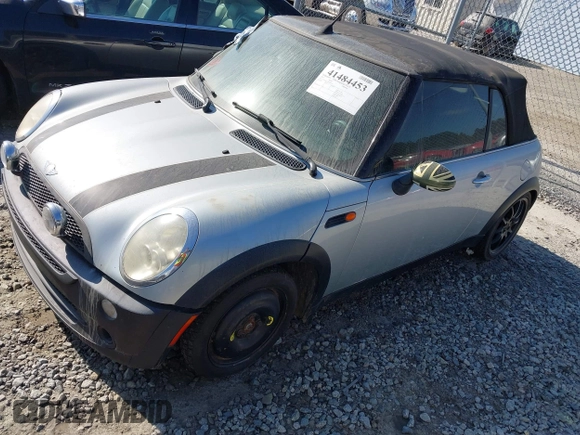 2006 MINI Convertible with VIN WMWRF33586TF64534, listed as a IAAI auction lot 41484453 with 180,748 mi miles and . Bid and sale history available at DreamBid. Image 2.