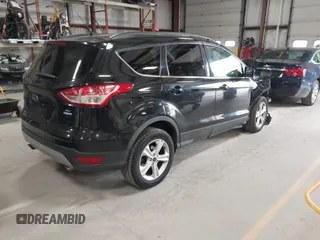 2015 Ford Escape SE with VIN 1FMCU9G97FUA21287, listed as a IAAI auction lot 41990144 with 55,036 mi miles and . Bid and sale history available at DreamBid. Image 4.