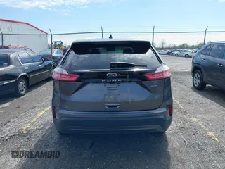 2022 Ford Edge SE z VIN 2FMPK4G97NBA53638, wystawiony jako IAAI lot #41799936 z przebiegiem 35 222 mil mil oraz . Historia ofert i sprzedaży dostępna na DreamBid. Obrazek 17.
