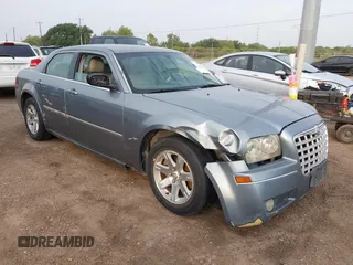 2006 Chrysler 300 z VIN 2C3KA53G06H525712, wystawiony jako IAAI lot #42417329 z przebiegiem 195 289 mil mil oraz . Historia ofert i sprzedaży dostępna na DreamBid. Obrazek 1.