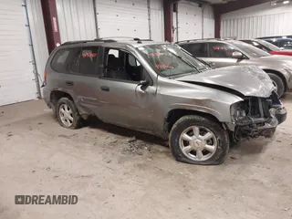 2005 GMC Envoy SLT with VIN 1GKDT13S352257892, listed as a IAAI auction lot 41690880 with 134,216 mi miles. Bid and sale history available at carsss.com. Image 1.