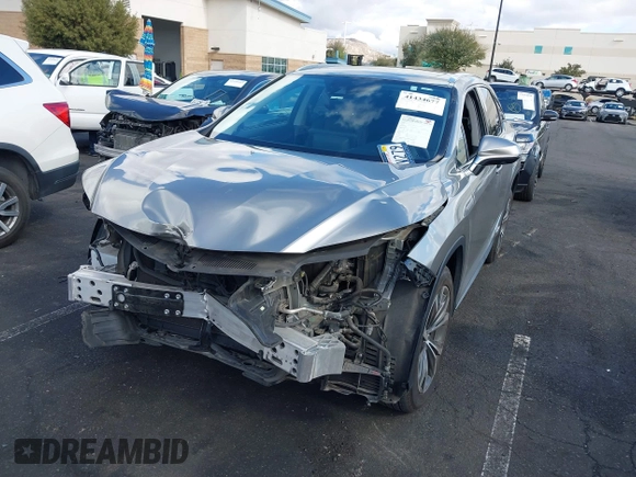 2022 Lexus RX 450h с VIN 2T2HGMDA0NC074486, выставлен на аукционе IAAI как лот 41434677 с пробегом 50 955 миль миль и . История ставок и продаж доступна на DreamBid. Изображение 19.