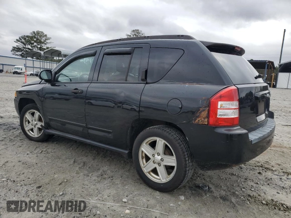 2008 Jeep Compass Sport with VIN 1J8FT47W28D766523, listed as a Copart auction lot 41433795 with 213,505 mi miles and Salvage Title. Bid and sale history available at carsss.com. Image 2.