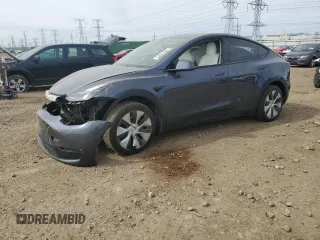 2023 Tesla Model Y Long Range z VIN 7SAYGAEE0PF646923, wystawiony jako Copart lot #54614625 z przebiegiem Nie podano mil oraz Szkoda całkowita • Salvage title. Historia ofert i sprzedaży dostępna na DreamBid. Obrazek 1.