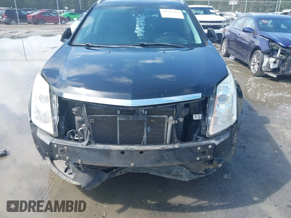 2014 Cadillac SRX Performance Collection с VIN 3GYFNFE38ES656510, выставлен на аукционе IAAI как лот 42336472 с пробегом 125 269 миль миль и . История ставок и продаж доступна на DreamBid. Изображение 12.
