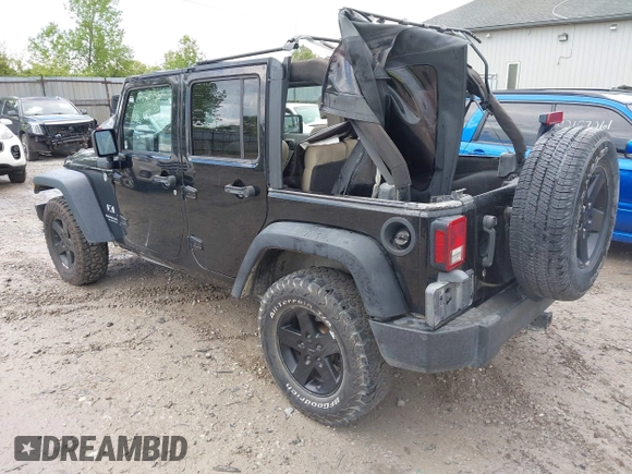 2008 Jeep Wrangler Unlimited X with VIN 1J4GA39108L501130, listed as a IAAI auction lot 42182601 with 177,507 mi miles and . Bid and sale history available at DreamBid. Image 3.