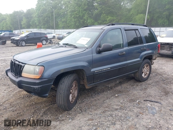 2002 Jeep Grand Cherokee Laredo z VIN 1J4GX48S62C201579, wystawiony jako IAAI lot #42102238 z przebiegiem 262 630 mil mil oraz . Historia ofert i sprzedaży dostępna na DreamBid. Obrazek 2.