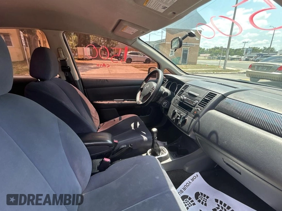 2009 Nissan Versa S with VIN 3N1BC13E19L499018, listed as a Copart auction lot 56711385 with 196,451 mi miles and Clean Title. Bid and sale history available at DreamBid. Image 5.